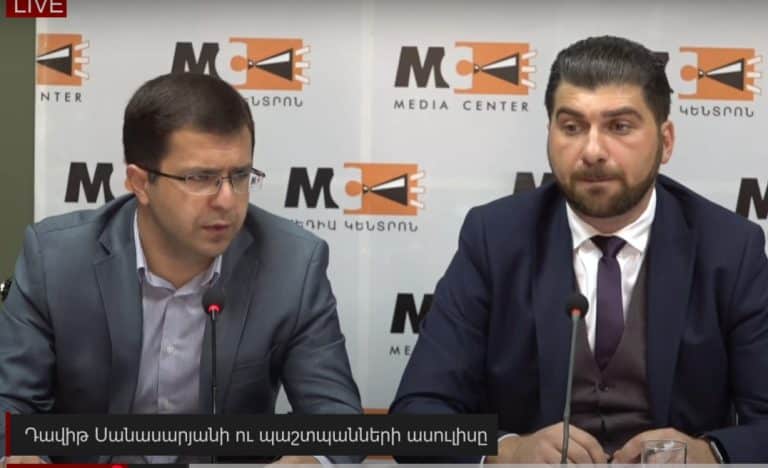On what basis was Davit Sanasaryan given the status of an accused and his official duties suspended